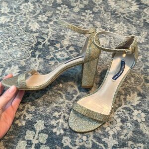 3.5” Stuart Weitzman NEARLYNUDE Strap Block Heel Sandal in Gold Lamé Shimmer